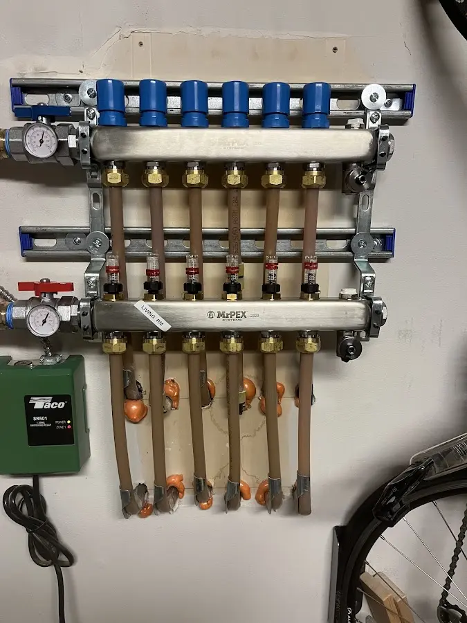 Plumber performing Water Heater Repair at a residential property in Denmark